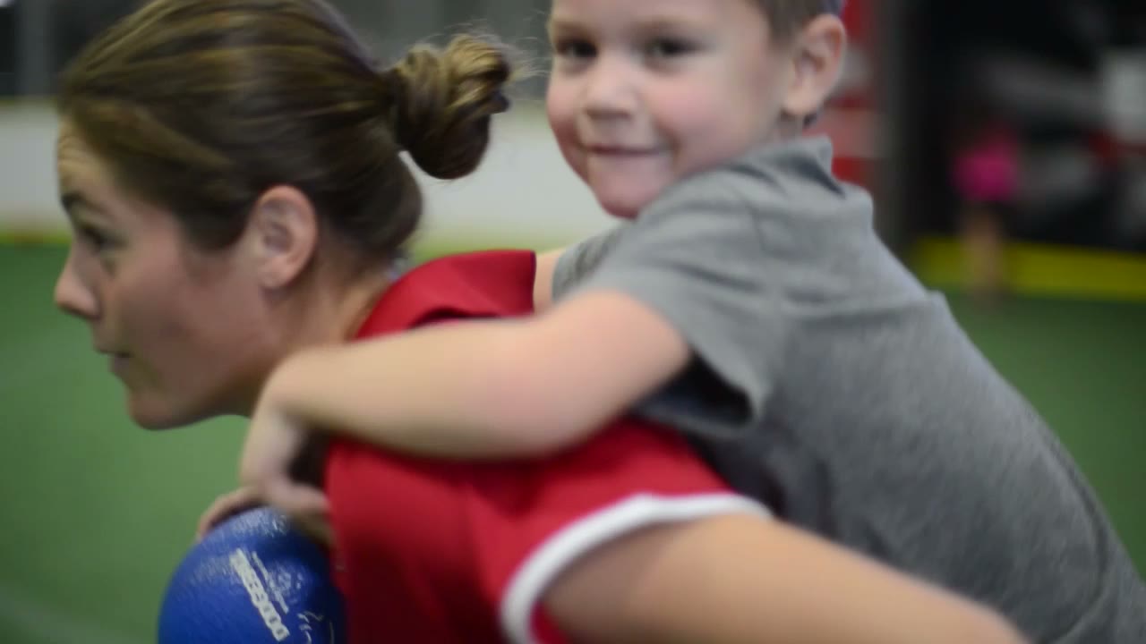 A parent and child at Arizona Sports Complex